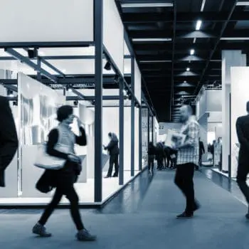 International Tradeshow visitorson a tradeshow stand ideal for websites and magazines layouts